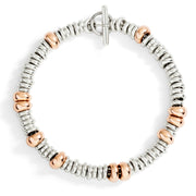 Bracciale Rondelle Classiche DoDo in argento 925 e bold in argento dorato oro rosa 18K con chiusura t-bar e anello brisé in acciaio.